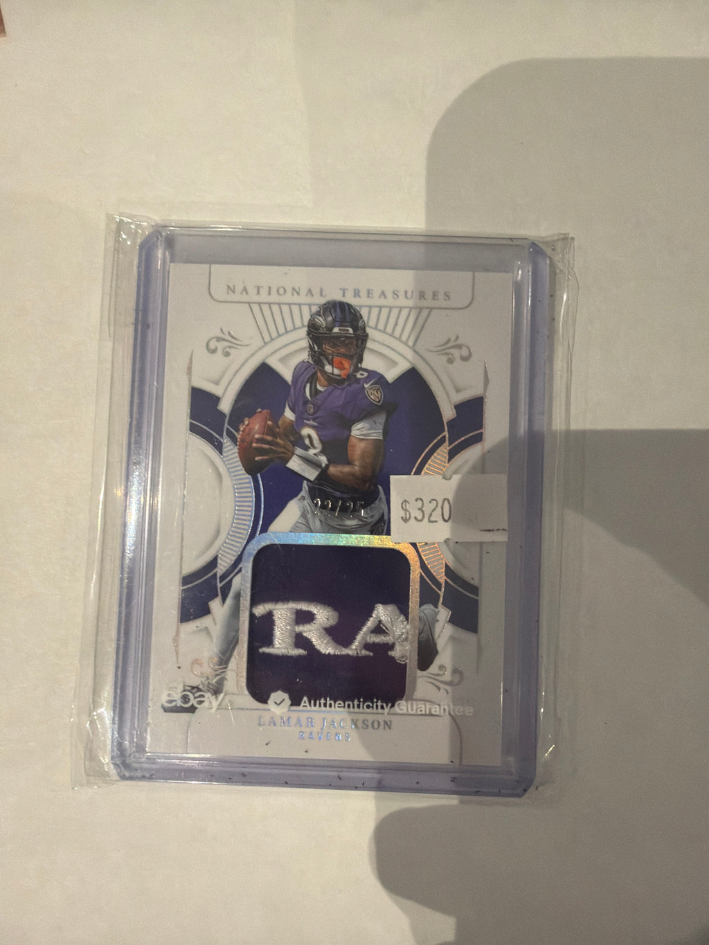 2025 national treasures patch Lamar Jackson 22/25